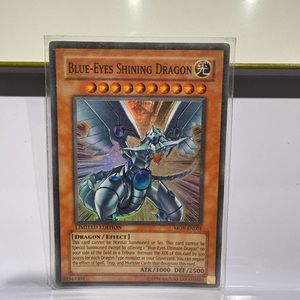 Blue eyes shining dragon yugioh yu-gi-oh card in sleeve